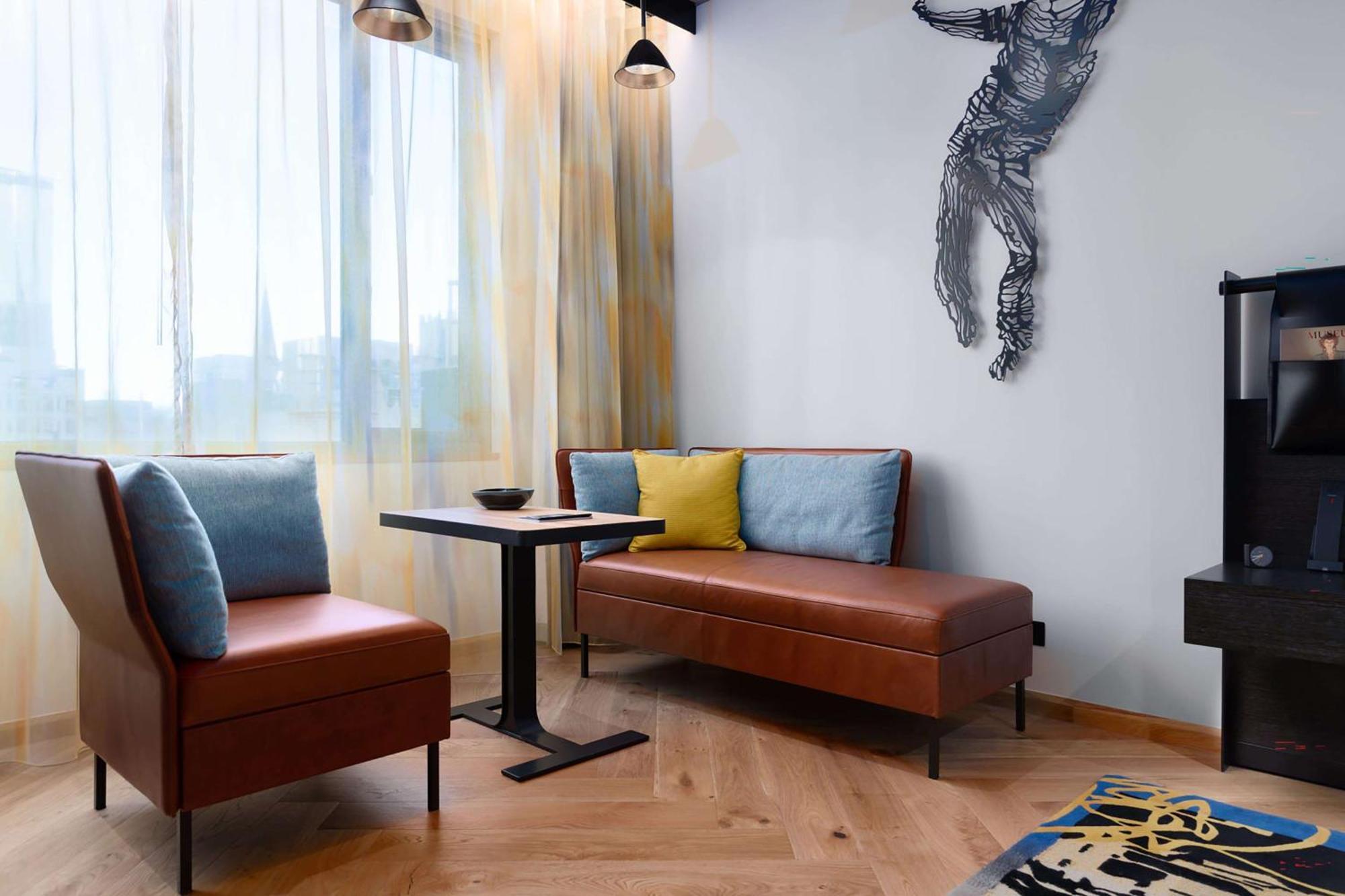 Qt Melbourne Hotel Exterior foto A living room in a serviced apartment in Beijing, China